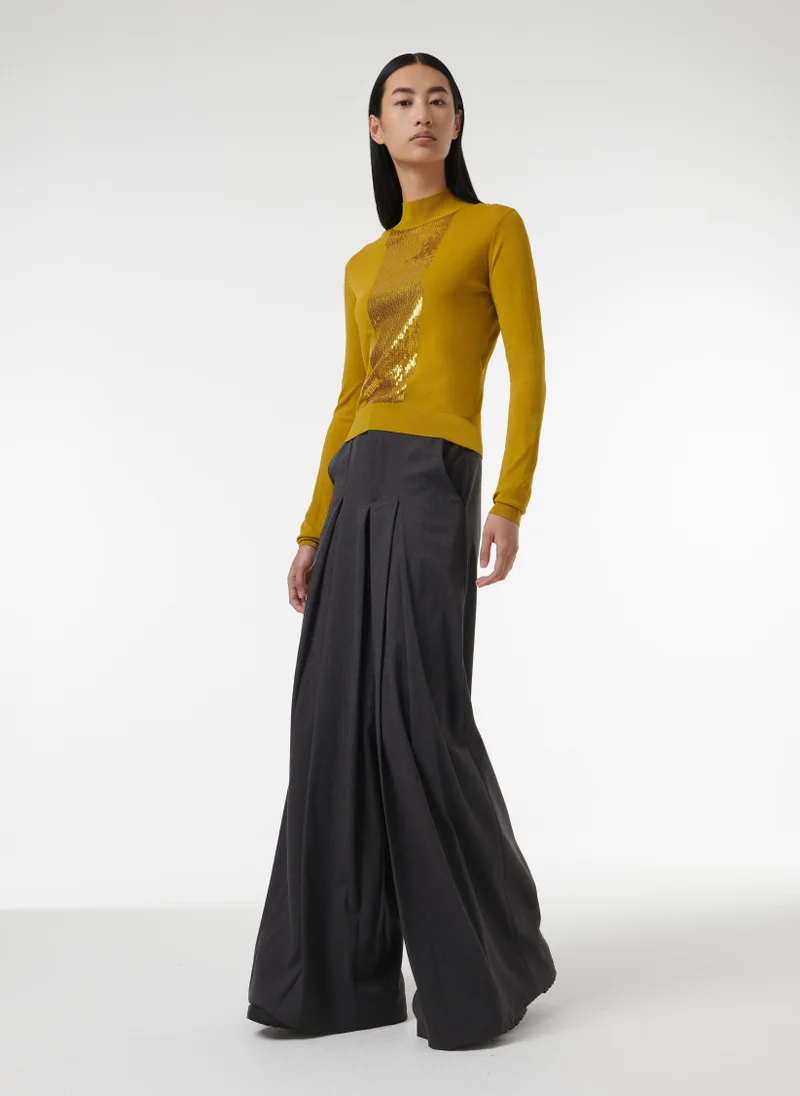 ليم بلوزة مزينة بالترتر