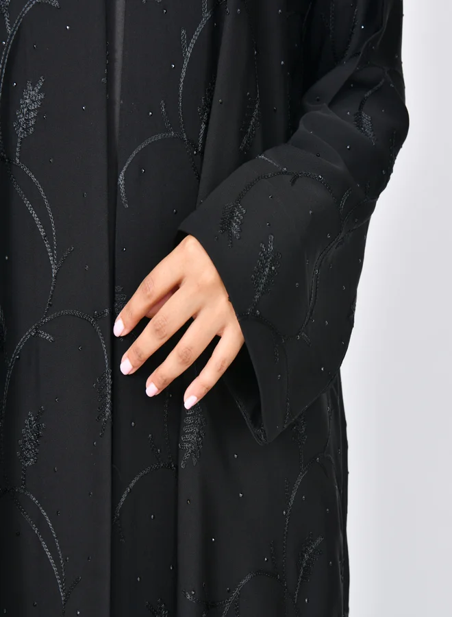 HAWRAA ABAYA Elegant black wrap abaya with elegant embroidery decorated with stones all over the abaya