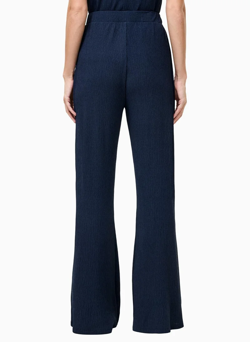 French Connection Washed Indigo Meera Textured Flared Pants for Women | Best Price UAE