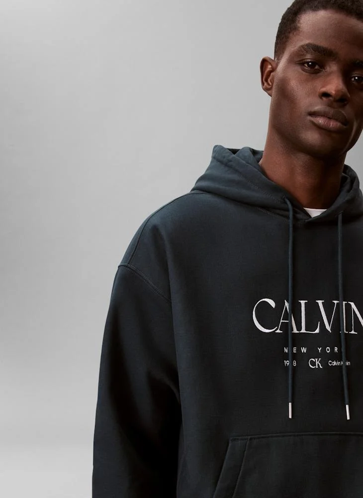 CALVIN KLEIN  Graphic Pullover Hoodie for Men | Best Price UAE