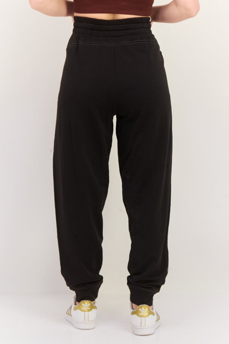 PUMA Women Sportswear Fit Outdoor Sweatpants, Black - Image 4