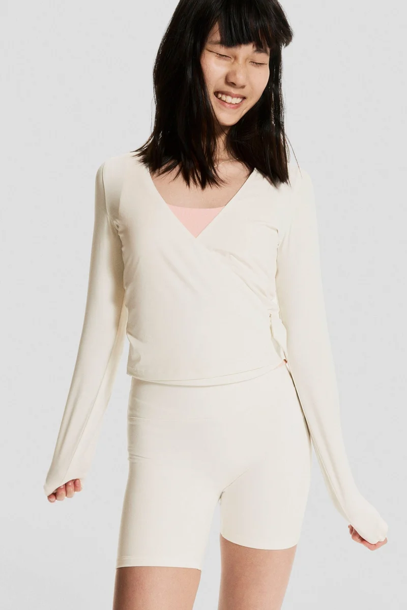 H&M Sports wrap top with SoftMove™