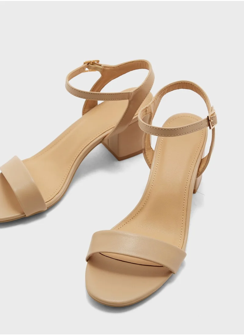 ترافل من نمشي Mid Block Heel Strap Sandal