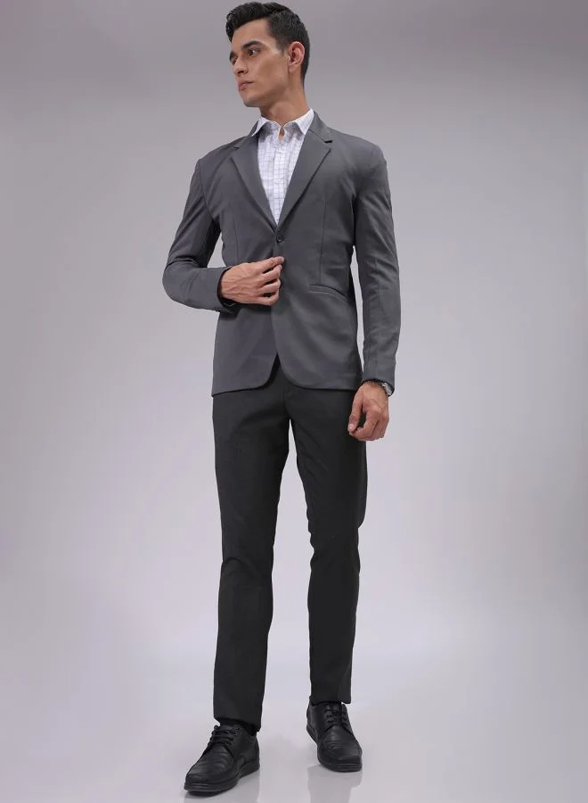ذا انديان كراج كو Men Slim Fit Solid Mid-Rise Stretchable Knitted Formal Trousers