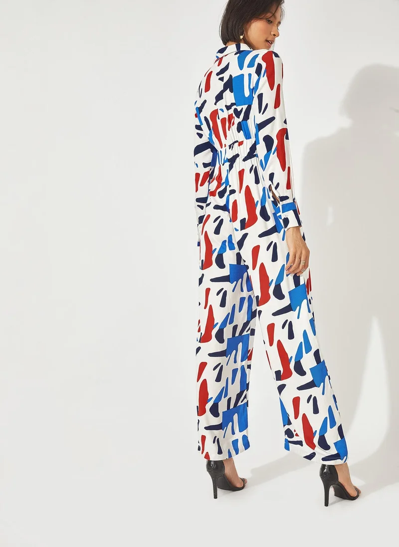 The Label Life Abstract Graphic Print Belted Jumpsuit
