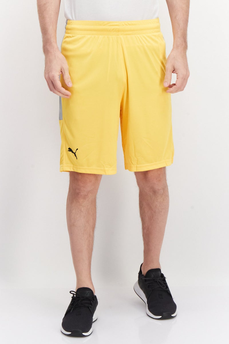 PUMA شورتات كرة سلة رياضية للرجال، أصفر - Image 1
