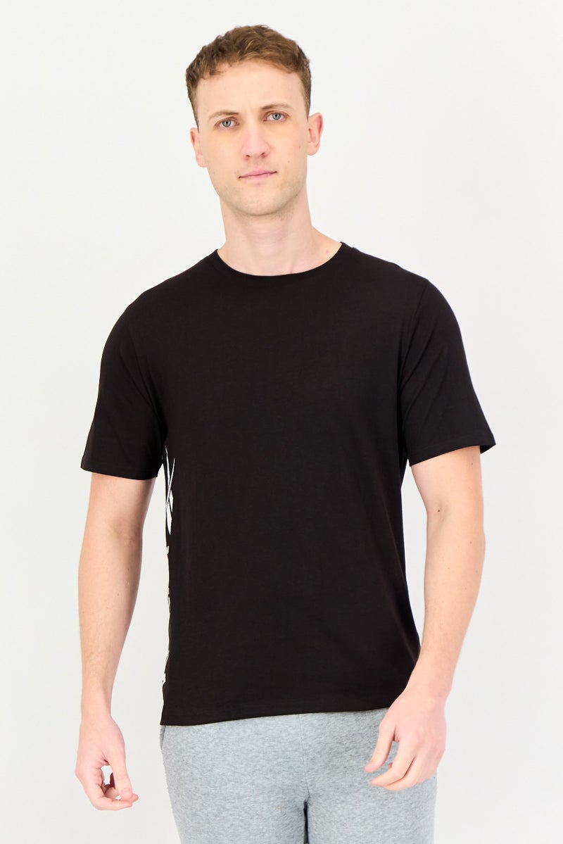 Reebok تي شيرت رياضي للرجال بأكمام قصيرة مناسب للخارج، أسود - Image 1