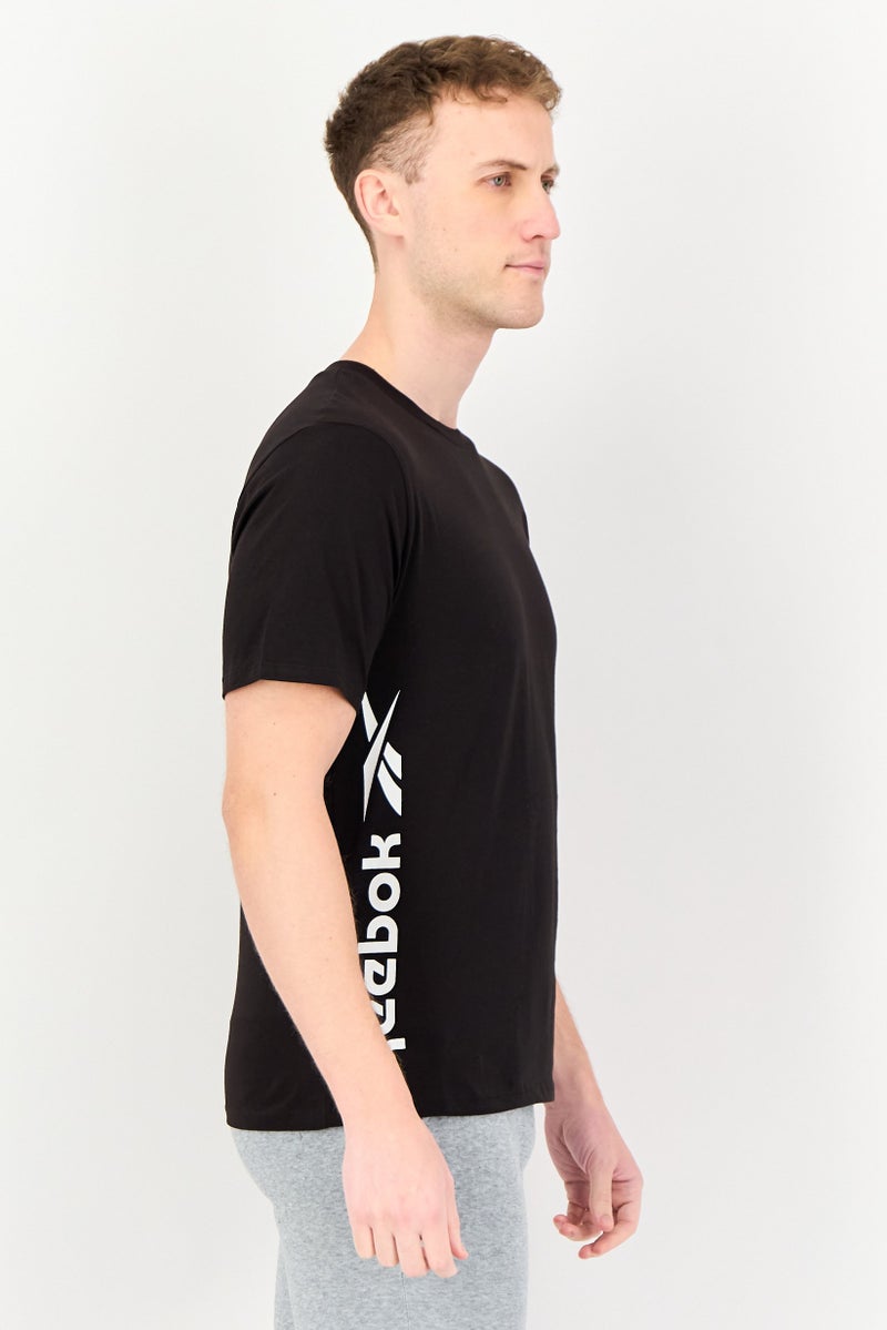 Reebok تي شيرت رياضي للرجال بأكمام قصيرة مناسب للخارج، أسود - Image 2