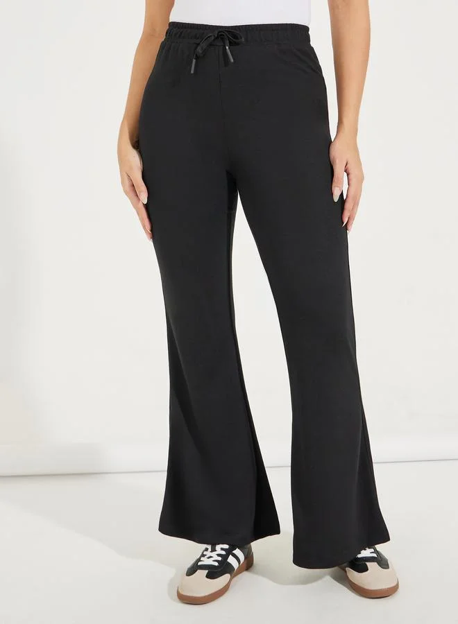 Styli Solid Flared Joggers with Drawstrings