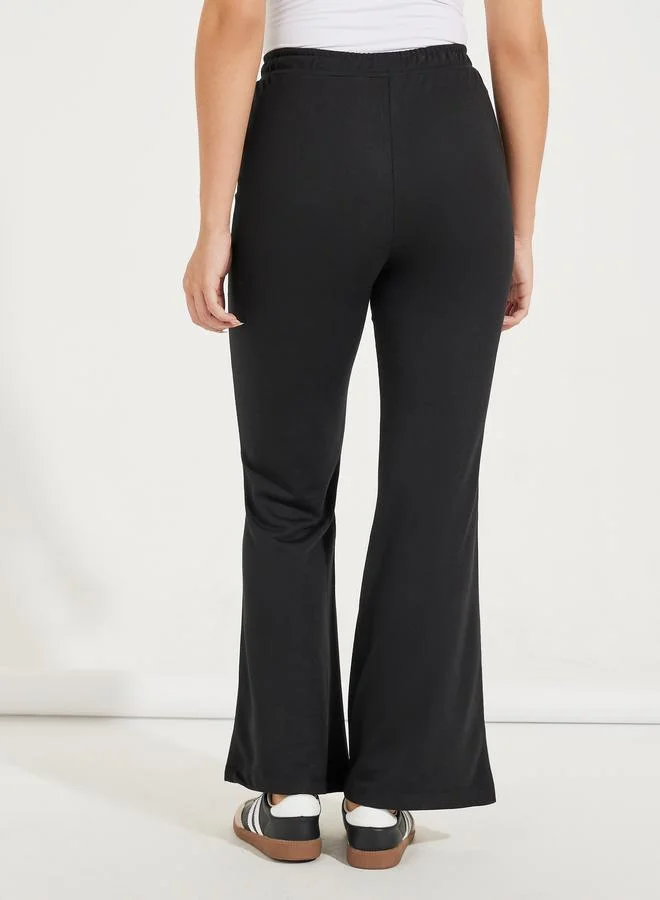 Styli Solid Flared Joggers with Drawstrings