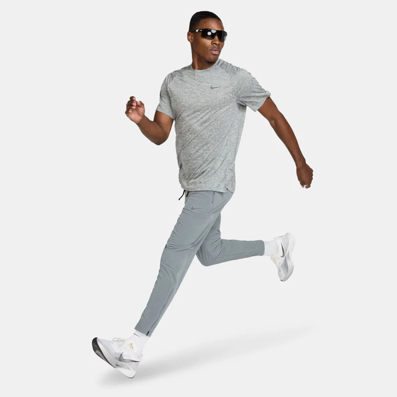 Nike Grey Men's Stride Dri-FIT Woven Running Pants for Men | Best Price UAE