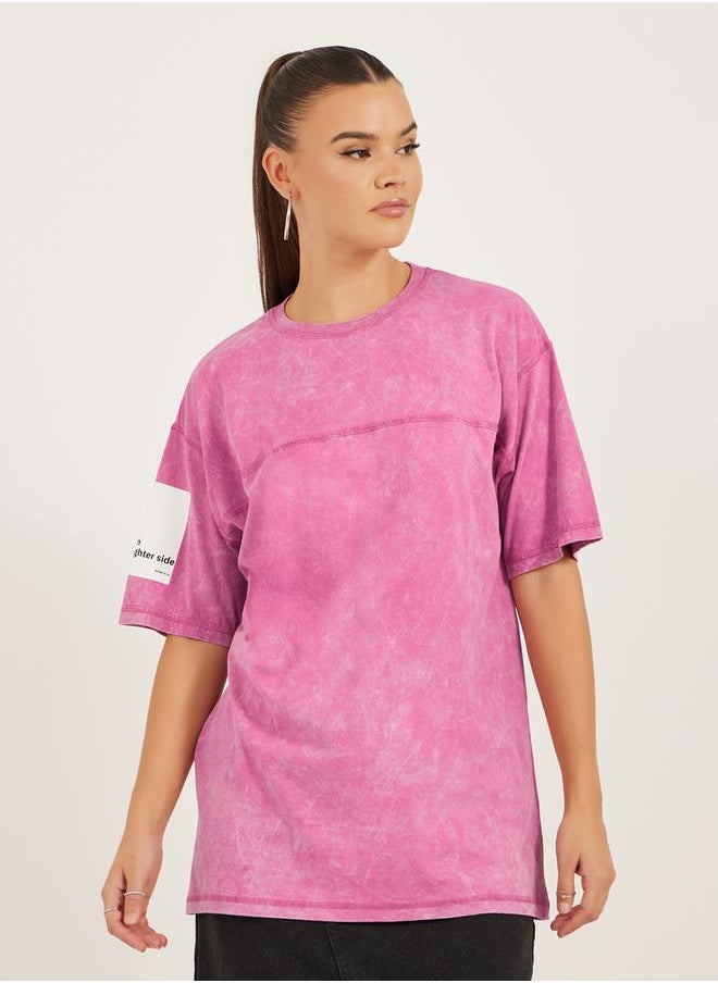 Styli - Cotton Acid wash with slogan printed sleeve and flat lock stich Short Sleeve Oversized Round Neck Longline T-shirt 16 - Image 1
