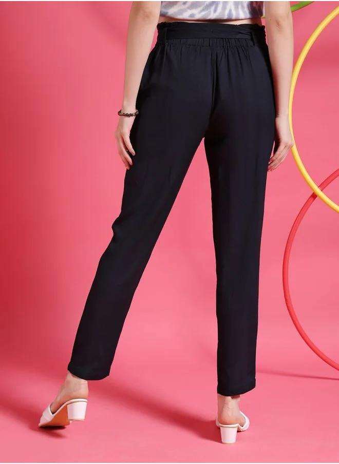 مرفوعة Women Tapered Solid High-Rise Pants