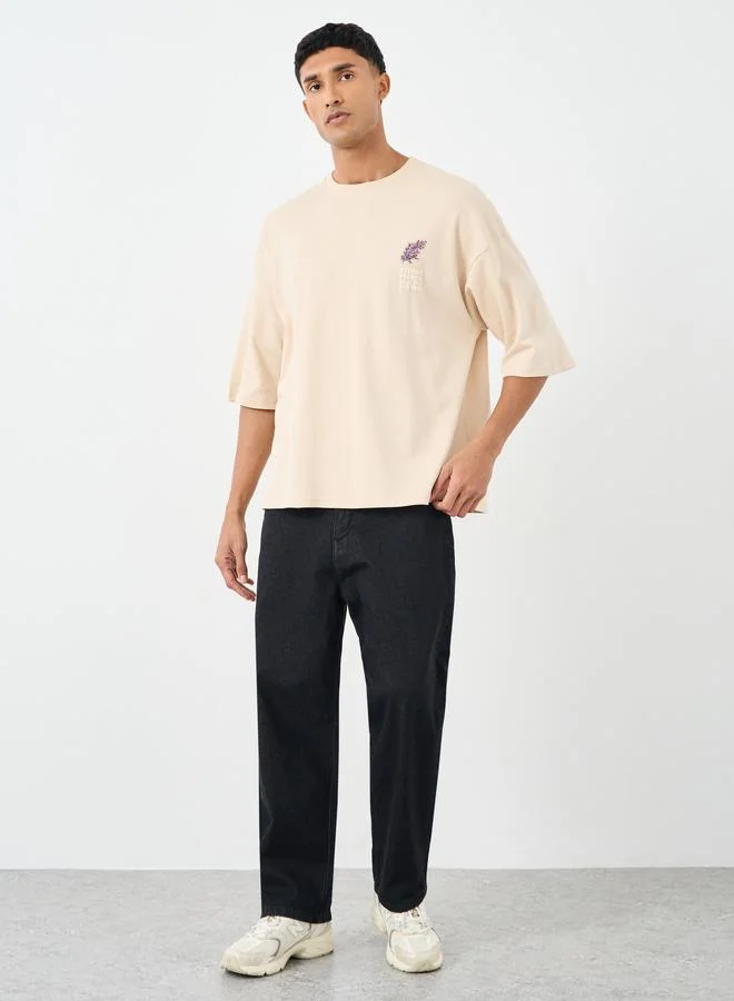 Styli Styli Men Off White Graphic Print Boxy Fit T-Shirt