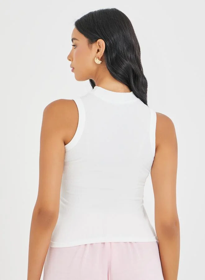 تايك تو توب كامي بياقة عالية مضلع بلون سادة