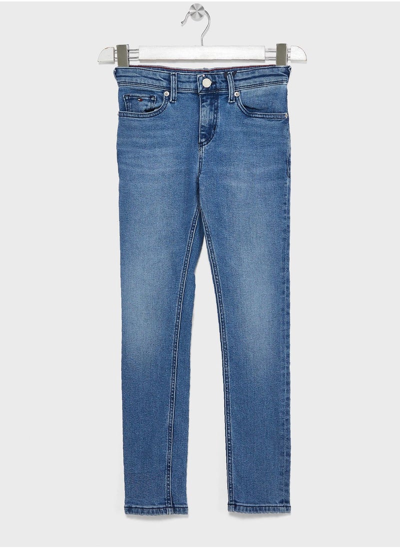 TOMMY HILFIGER - Youth Mid Wash Slim Jeans - Image 1