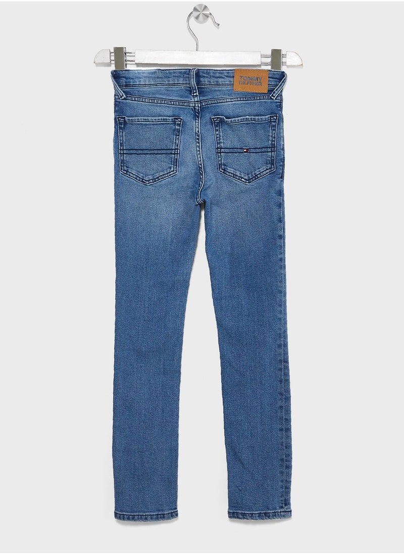 TOMMY HILFIGER - Youth Mid Wash Slim Jeans - Image 1