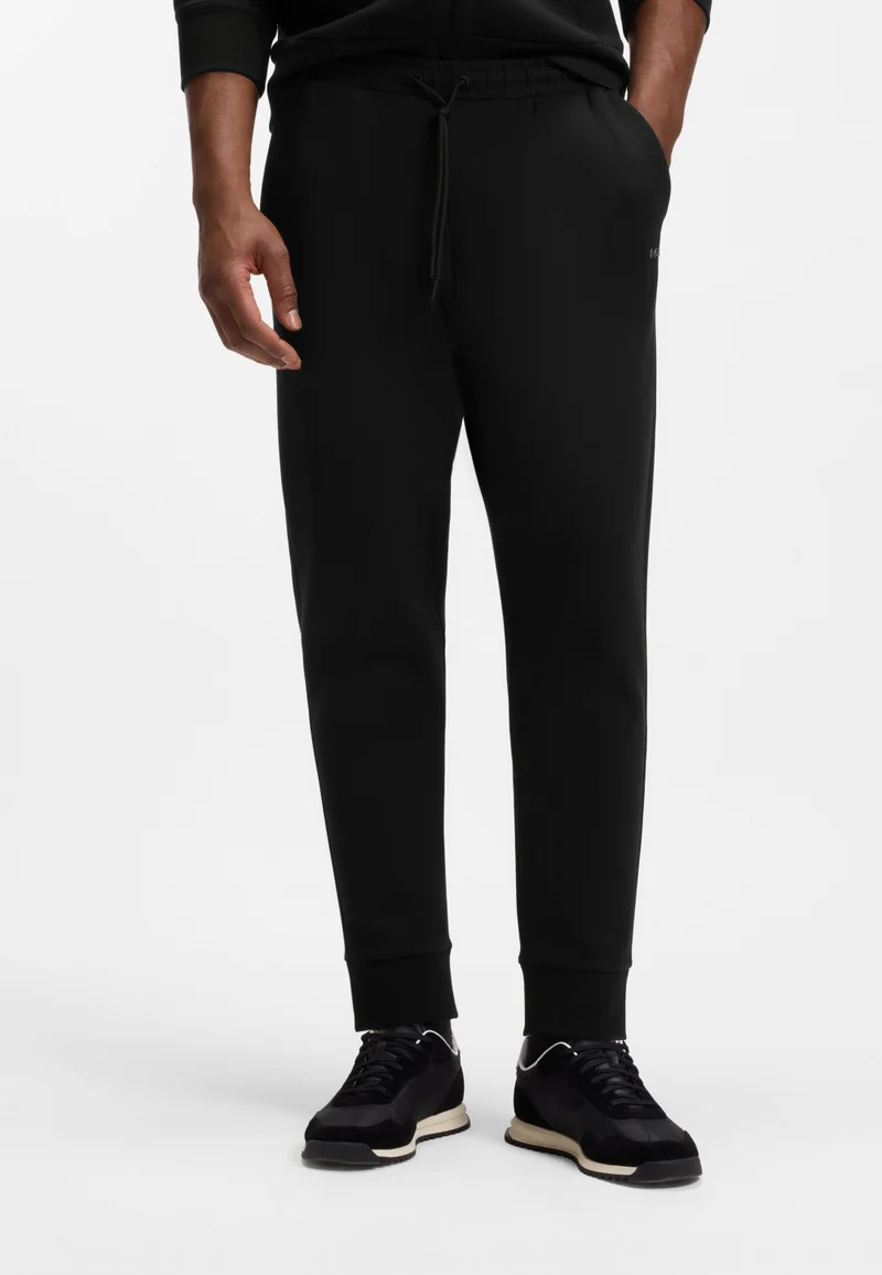 بوس بنطلون رياضي قطن مطاطي بطبعة شعار