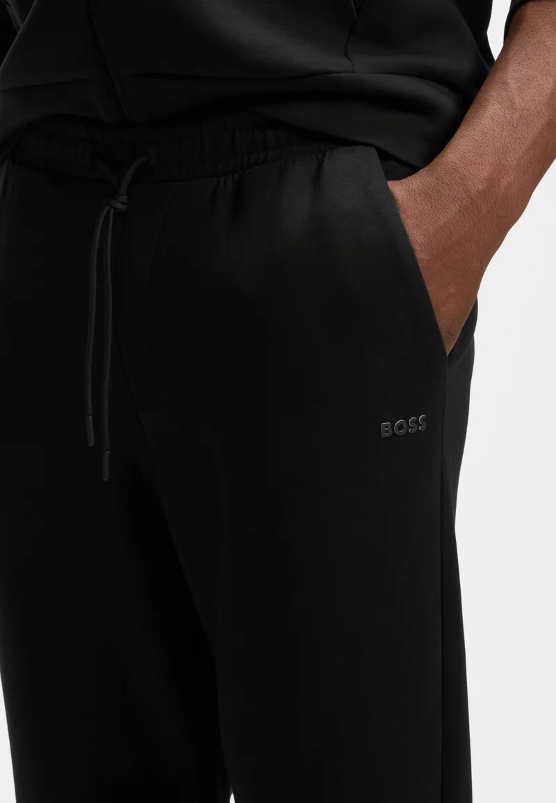 BOSS Black Stretch-cotton tracksuit bottoms with logo print for Men | Best Price UAE
