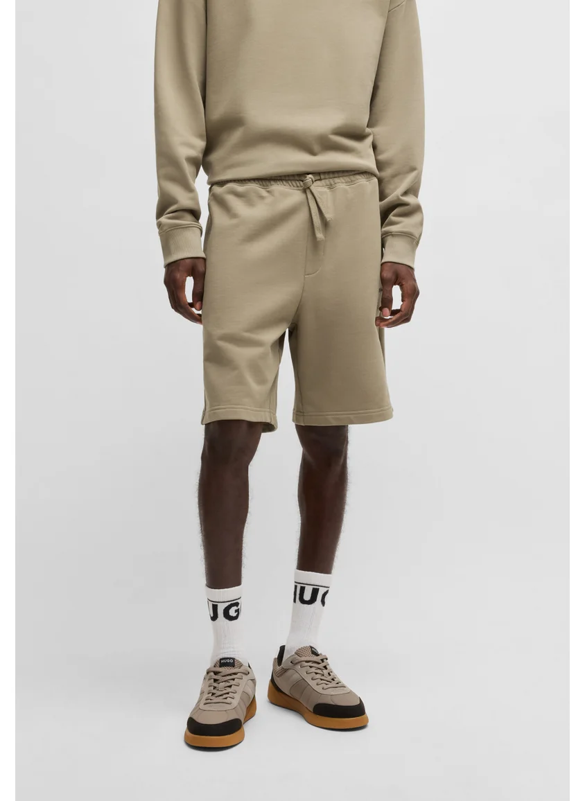 هوجو Relaxed-fit shorts in cotton terry with logo print