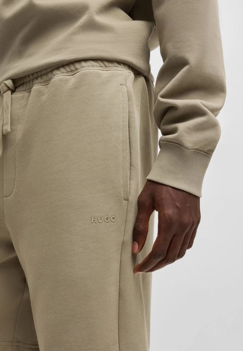 HUGO Relaxed-fit shorts in cotton terry with logo print
