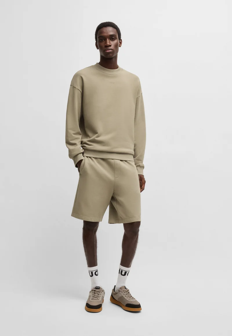 HUGO Relaxed-fit shorts in cotton terry with logo print