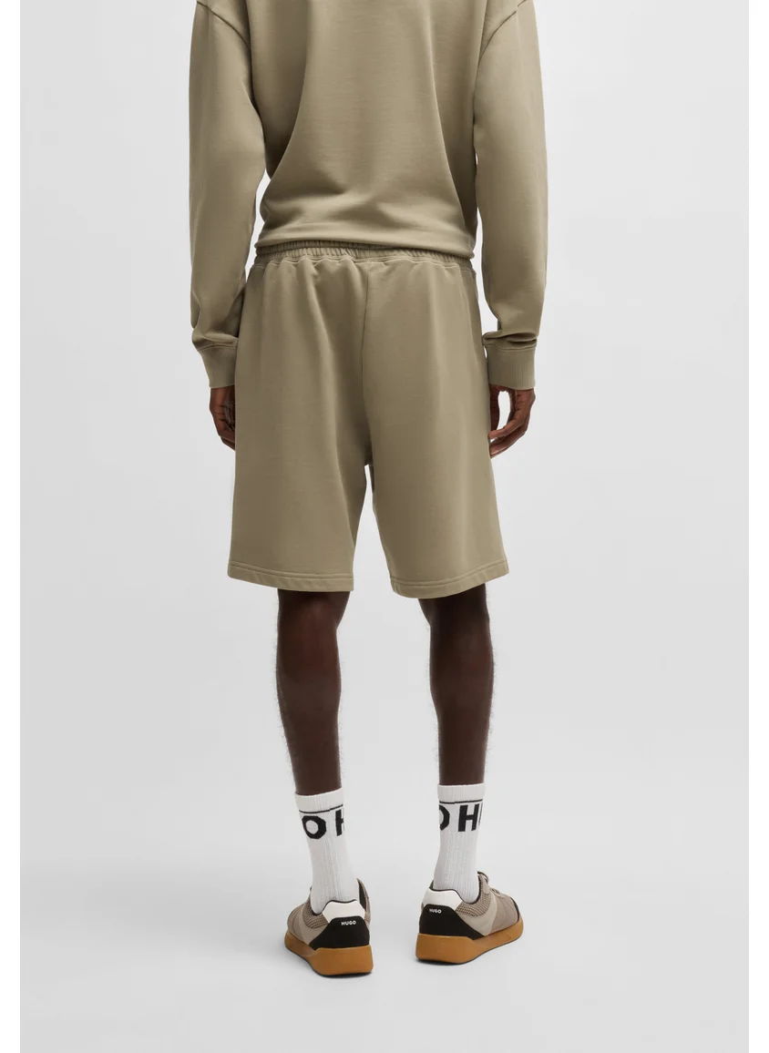 هوجو Relaxed-fit shorts in cotton terry with logo print