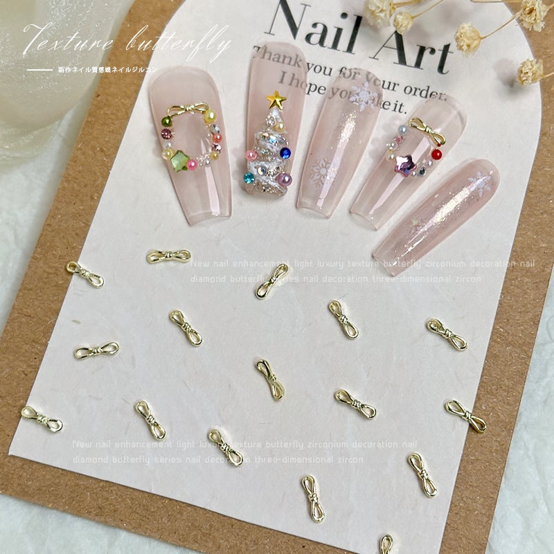 Alloy Bow Nail Ornaments 10 Net Red Explosions Gold And Silver Small Bow Tie Joker Christmas Nail Drill Accessories - Image 3