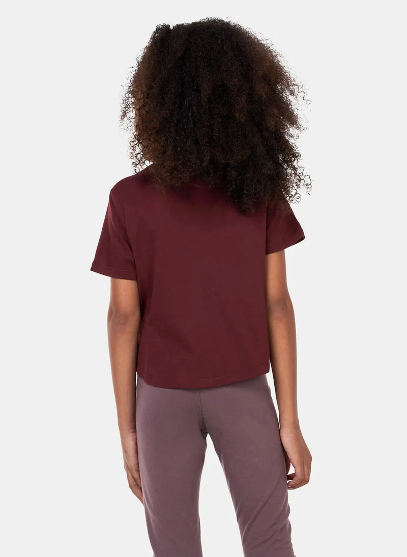 نايكي Kids' Dri-FIT Sport Essential+ Cropped Training T-Shirt (Older Kids)