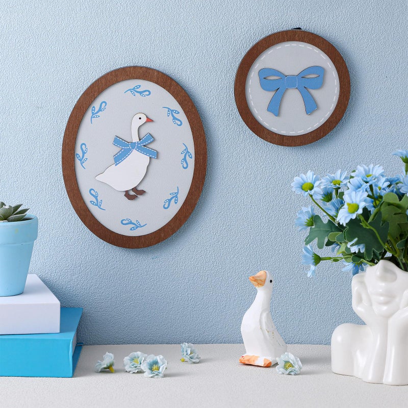 AceOrbit 2 Pcs Goose Nursery Decor, Wood Vintage Silly Goose Wall Art, Funny Duck with Blue Bow, Cute Duck Decor, Wooden Round Framed Wall Hanging Decoration for Nursery Baby Room Playroom Bedroom - Image 3