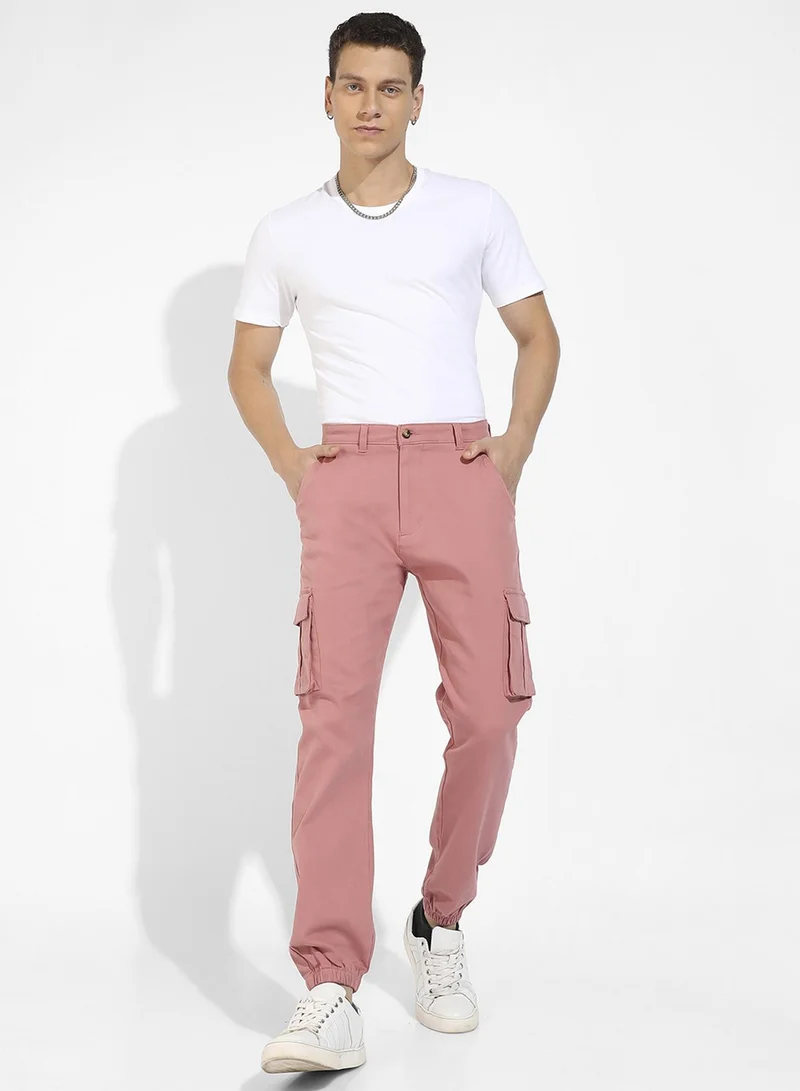 Campus Sutra Campus Sutra Men's Nude Pink Cuffed Hem Cargo Trousers For Casual Wear | 6 Pockets | Regular Fit | Button Closure | Cotton Poly Cargo Pant Crafted With Comfort Fit For Everyday Wear