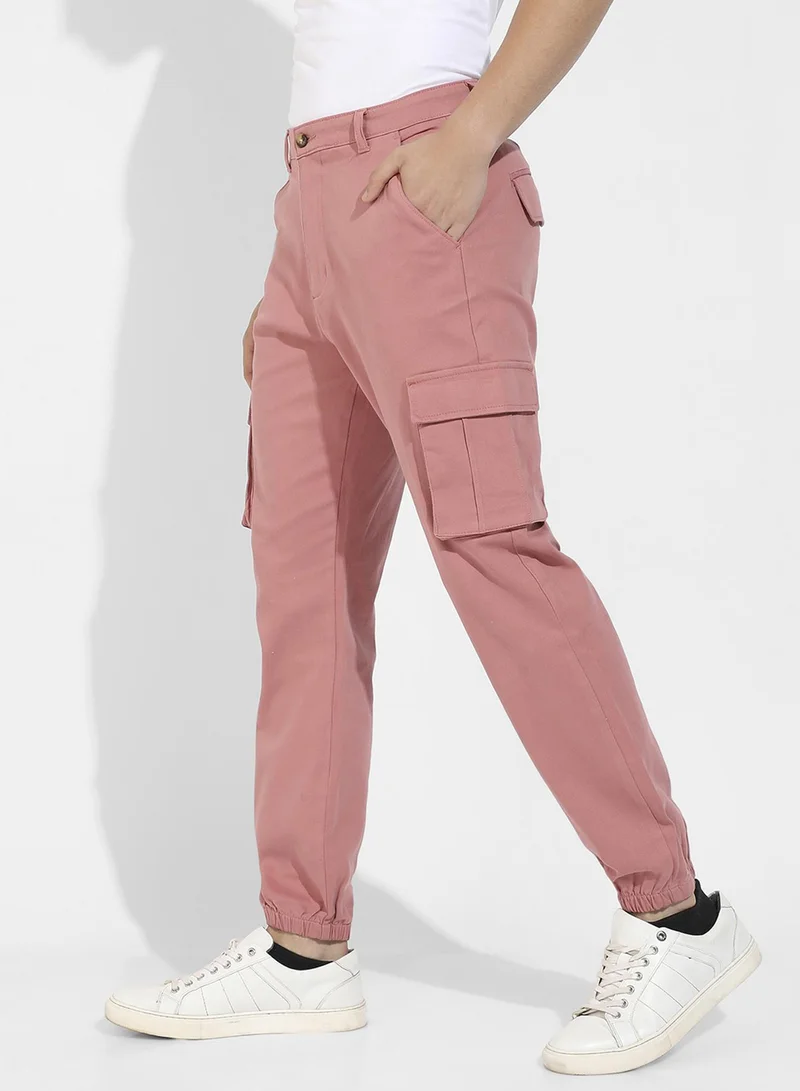 Campus Sutra Campus Sutra Men's Nude Pink Cuffed Hem Cargo Trousers For Casual Wear | 6 Pockets | Regular Fit | Button Closure | Cotton Poly Cargo Pant Crafted With Comfort Fit For Everyday Wear