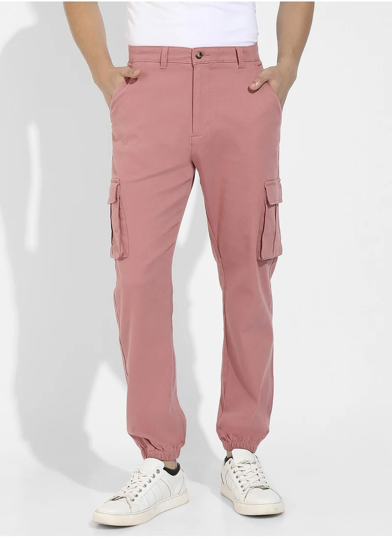 Campus Sutra Campus Sutra Men's Nude Pink Cuffed Hem Cargo Trousers For Casual Wear | 6 Pockets | Regular Fit | Button Closure | Cotton Poly Cargo Pant Crafted With Comfort Fit For Everyday Wear