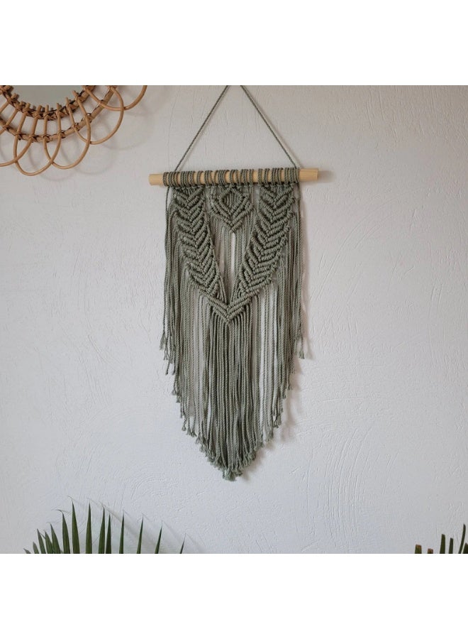 Antikiano A handmade macrame piece made of cotton threads. It has a simple and beautiful design that adds a special decorative touch to any room. Perfect for hanging on the wall in bedrooms or living rooms, and makes a lovely gift for handmade item lovers. - Image 1
