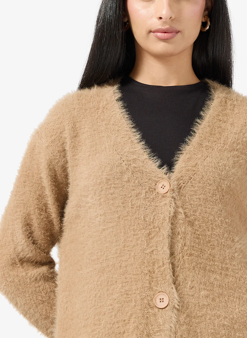 ايلا كارديجان بأزرار مريح