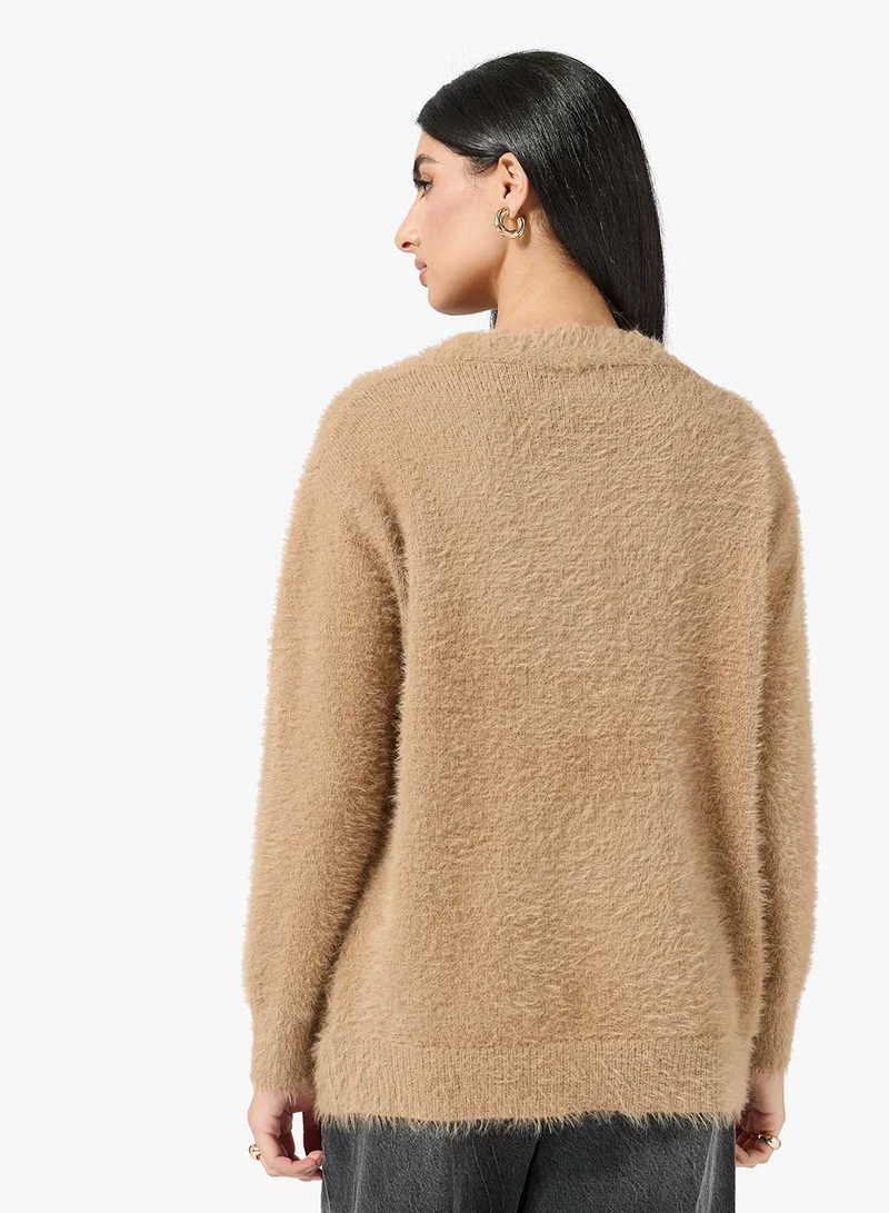 ايلا كارديجان بأزرار مريح