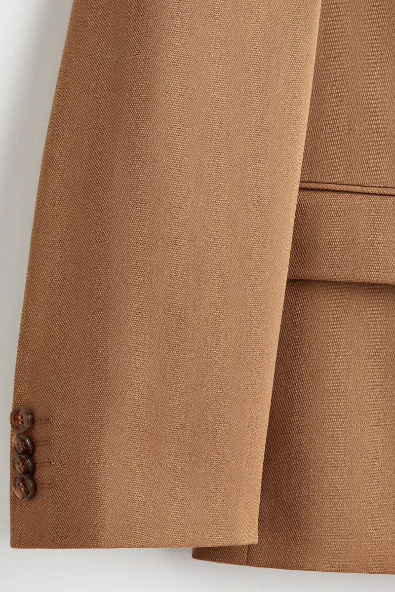 اتش اند ام جاكيت بقصة مريحة وصفين من الأزرار على الصدر