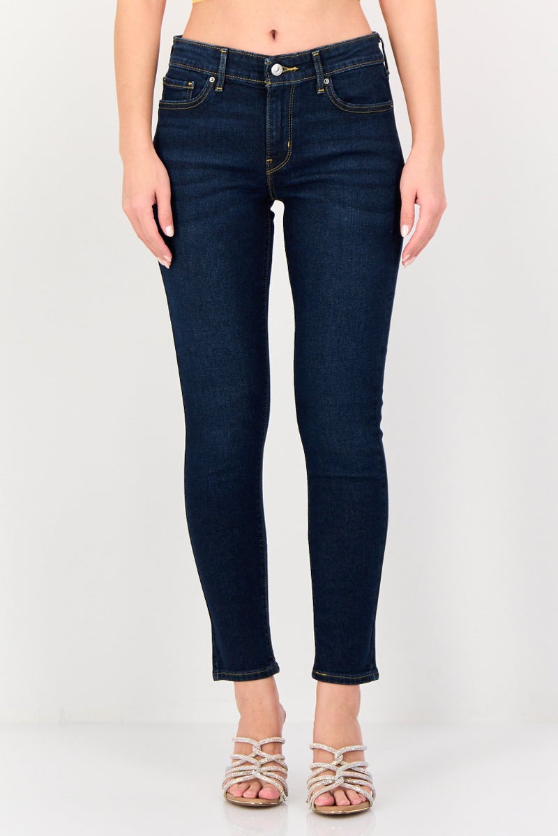 Levi's جينز ضيق للنساء بتمدد مغسول، أزرق داكن - Image 1