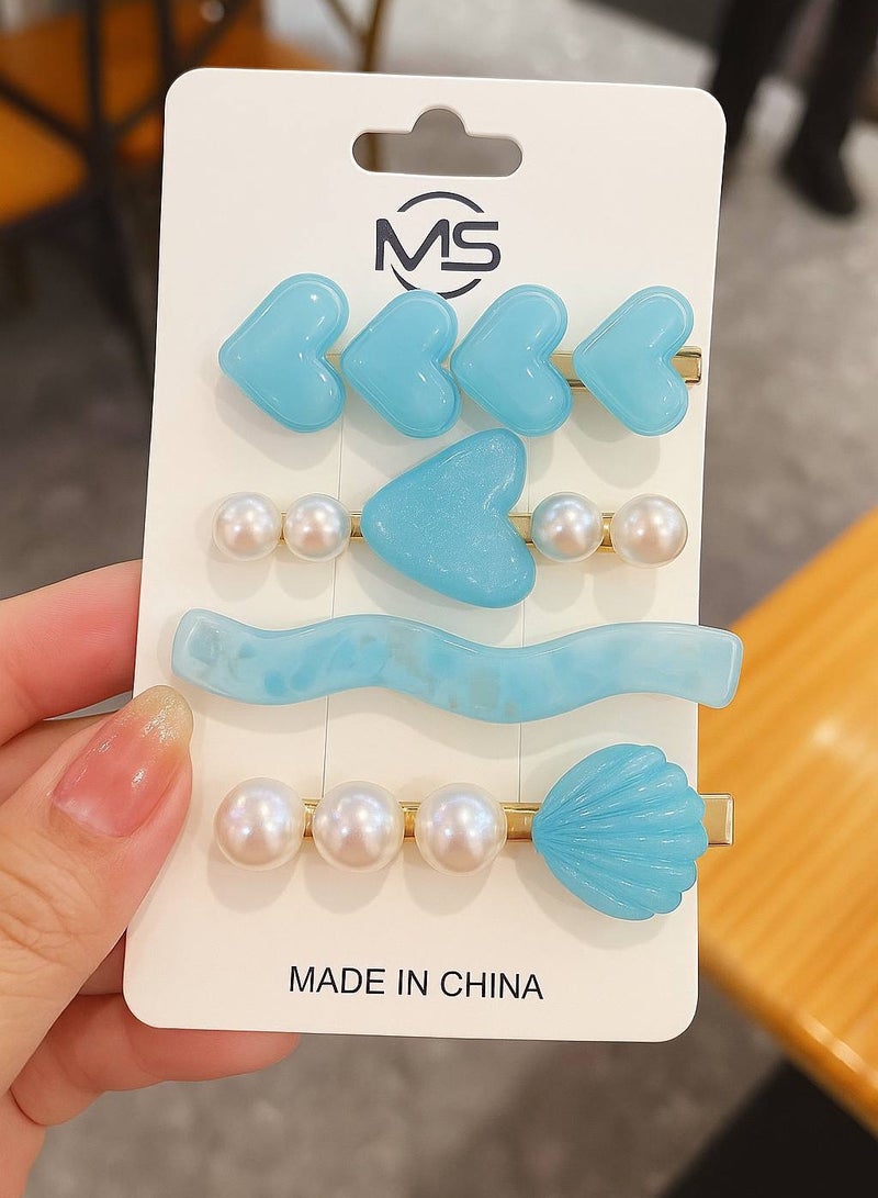 مجموعة من 4 مشابك شعر على بطاقة، تتميز بتصاميم مرحة ومبدعة بألوان زاهية وجذابة. مصنوعة من مواد عالية الجودة، مناسبة لجميع الأذواق والأعمار. - Image 3