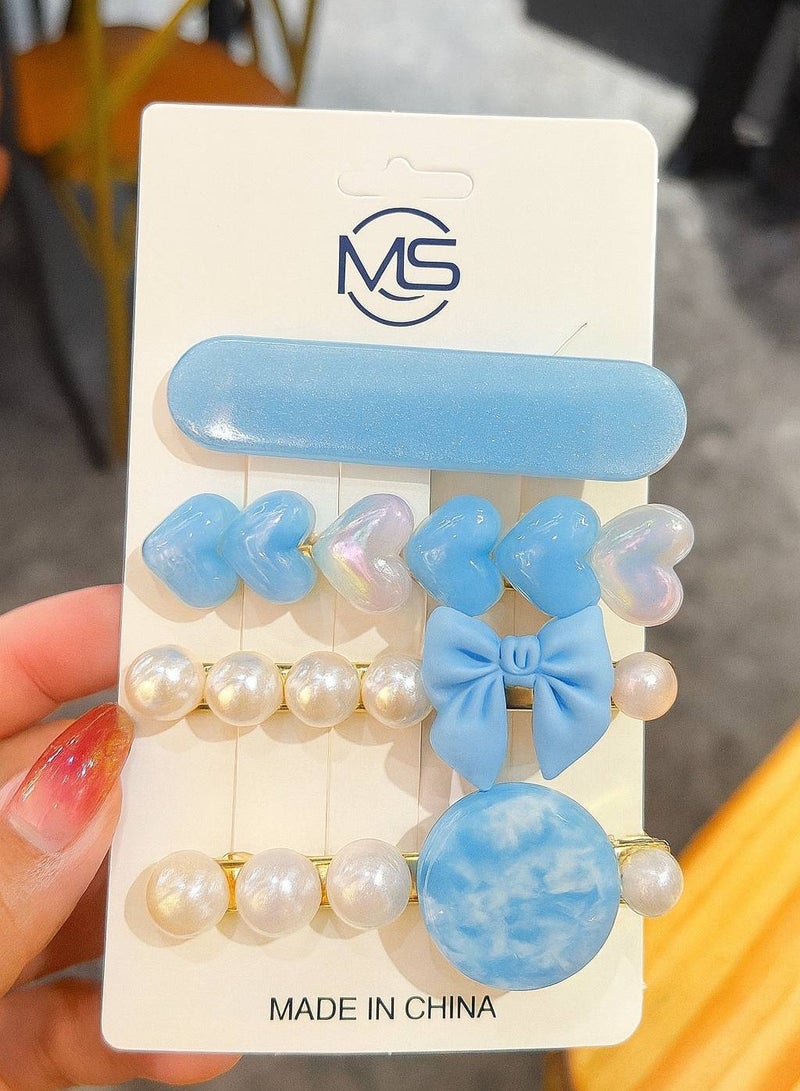 مجموعة من 4 مشابك شعر على بطاقة، تتميز بتصاميم مرحة ومبدعة بألوان زاهية وجذابة. مصنوعة من مواد عالية الجودة، مناسبة لجميع الأذواق والأعمار. - Image 4