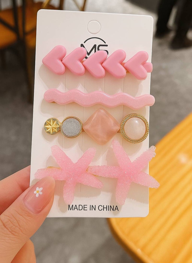 مجموعة من 4 مشابك شعر على بطاقة، تتميز بتصاميم مرحة ومبدعة بألوان زاهية وجذابة. مصنوعة من مواد عالية الجودة، مناسبة لجميع الأذواق والأعمار. - Image 1