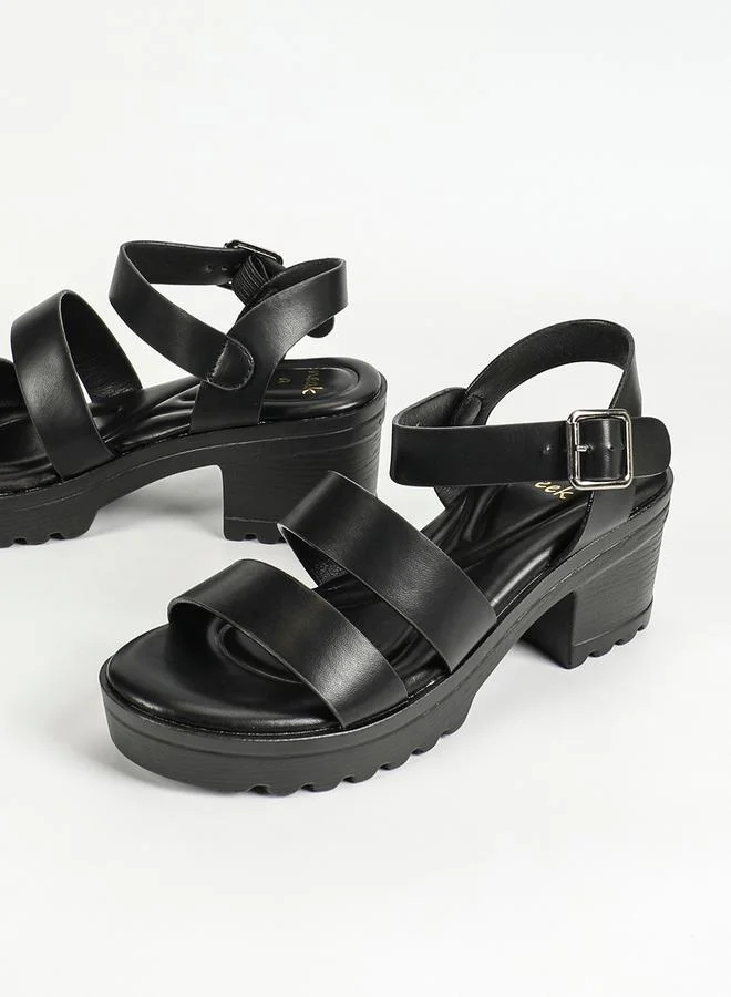 Sneak-a-Peek Solid Ankle Strap Block Heel Sandals by Styli