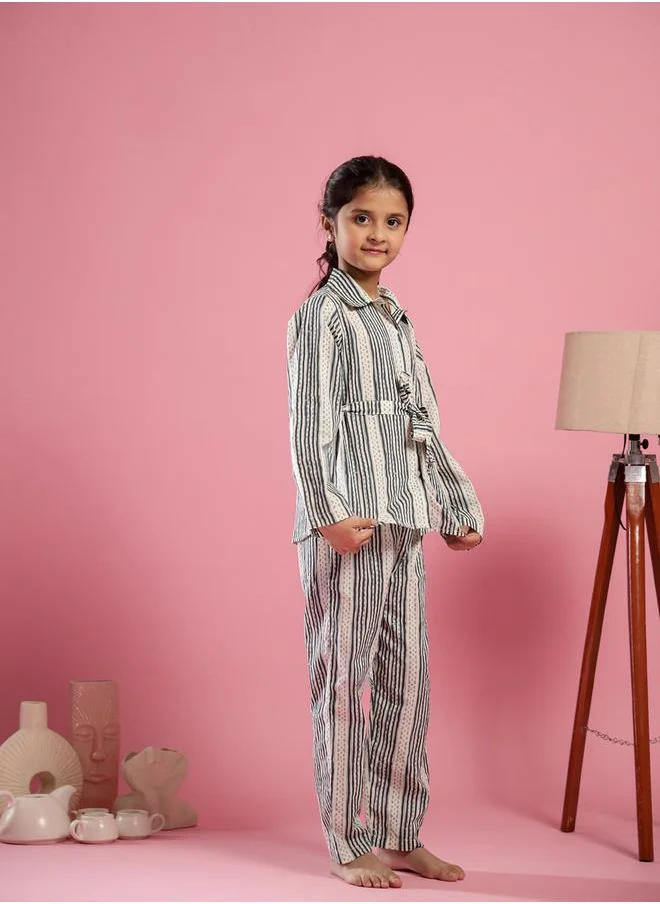 سانسكريتي هومز Striped Collared Shirt and Trousers Set by Styli