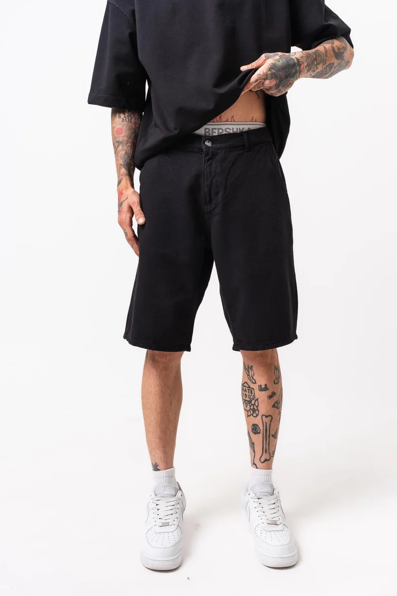 ريسباير شورت رجالي مصبوغ بالقطعة (Garment Dye) لون أسود