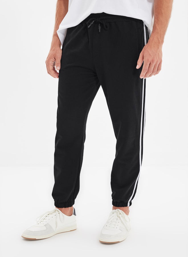 trendyol Black Regular Cut Striped Zipper Pocket Elastic Leg Jogger Sweatpants - Image 1