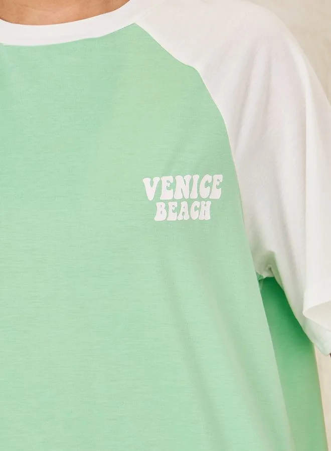 ستايلي Oversized Venice Beach Slogan Raglan Sleeves T-Shirt