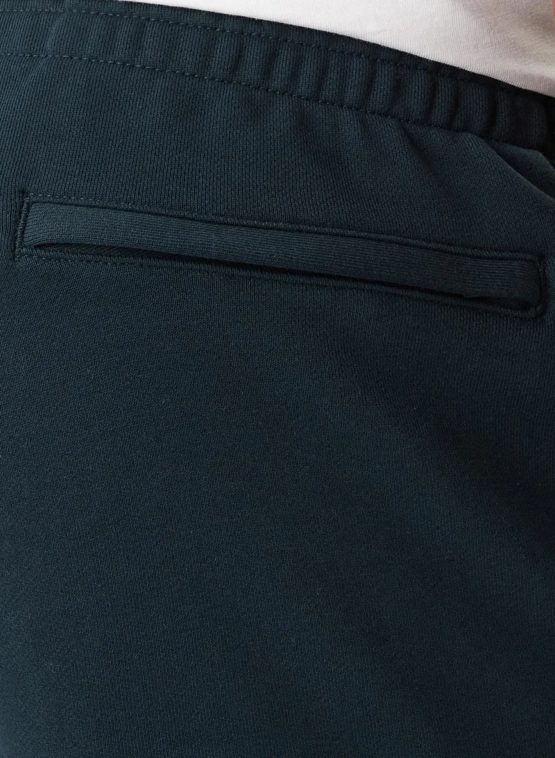 Calvin Klein Jeans  Relaxed Cotton Terry Joggers for Men | Best Price UAE