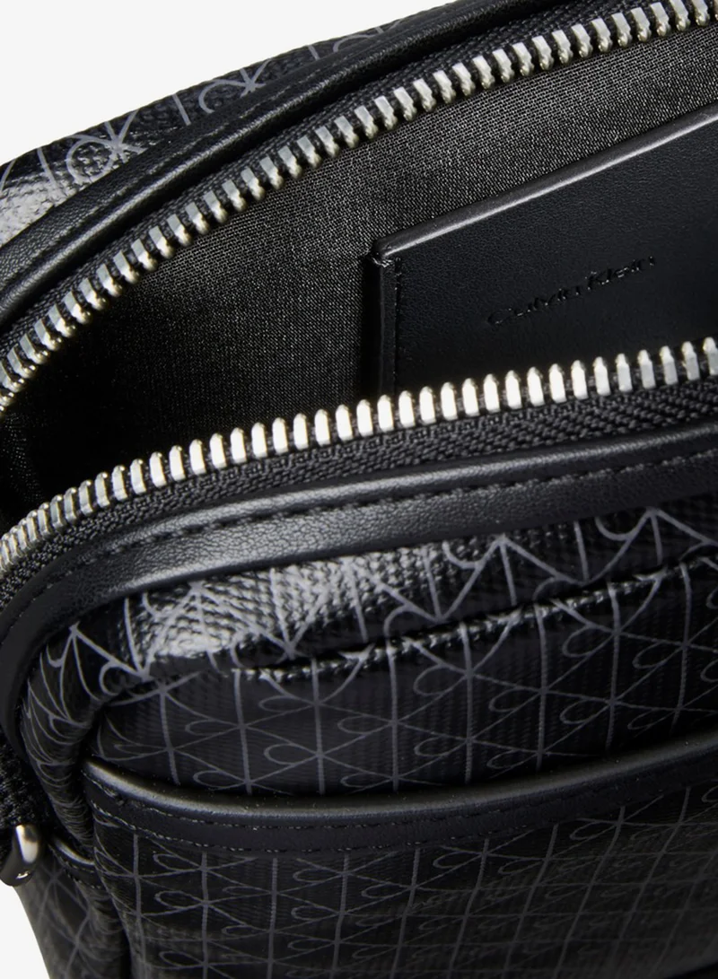 Calvin Klein Black AOP Coated Emblem Print Crossbody Reporter Bag for Men | Best Price UAE