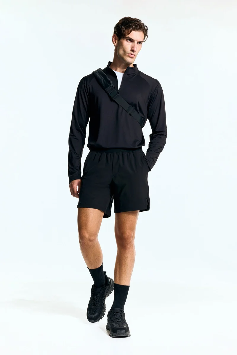 اتش اند ام شورت للركض بطول متوسط من نسيج دراي موف™