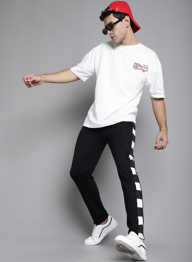 تايك تو بنطلون رياضي رجالي بخصر مطاطي وخطوط جانبية أسود من دور - Image 5